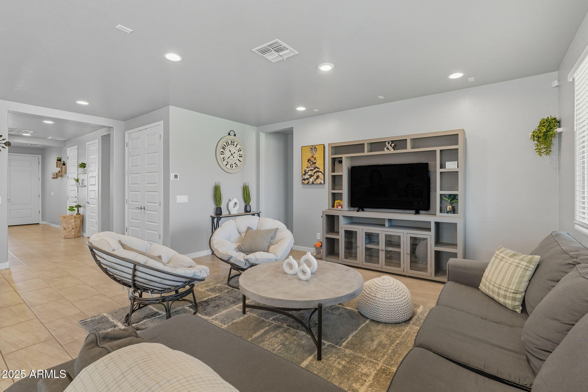 12404 East Soloman Road Gold Canyon, AZ 85118 - Photo 10 of 47 a living room with furniture and a flat screen tv