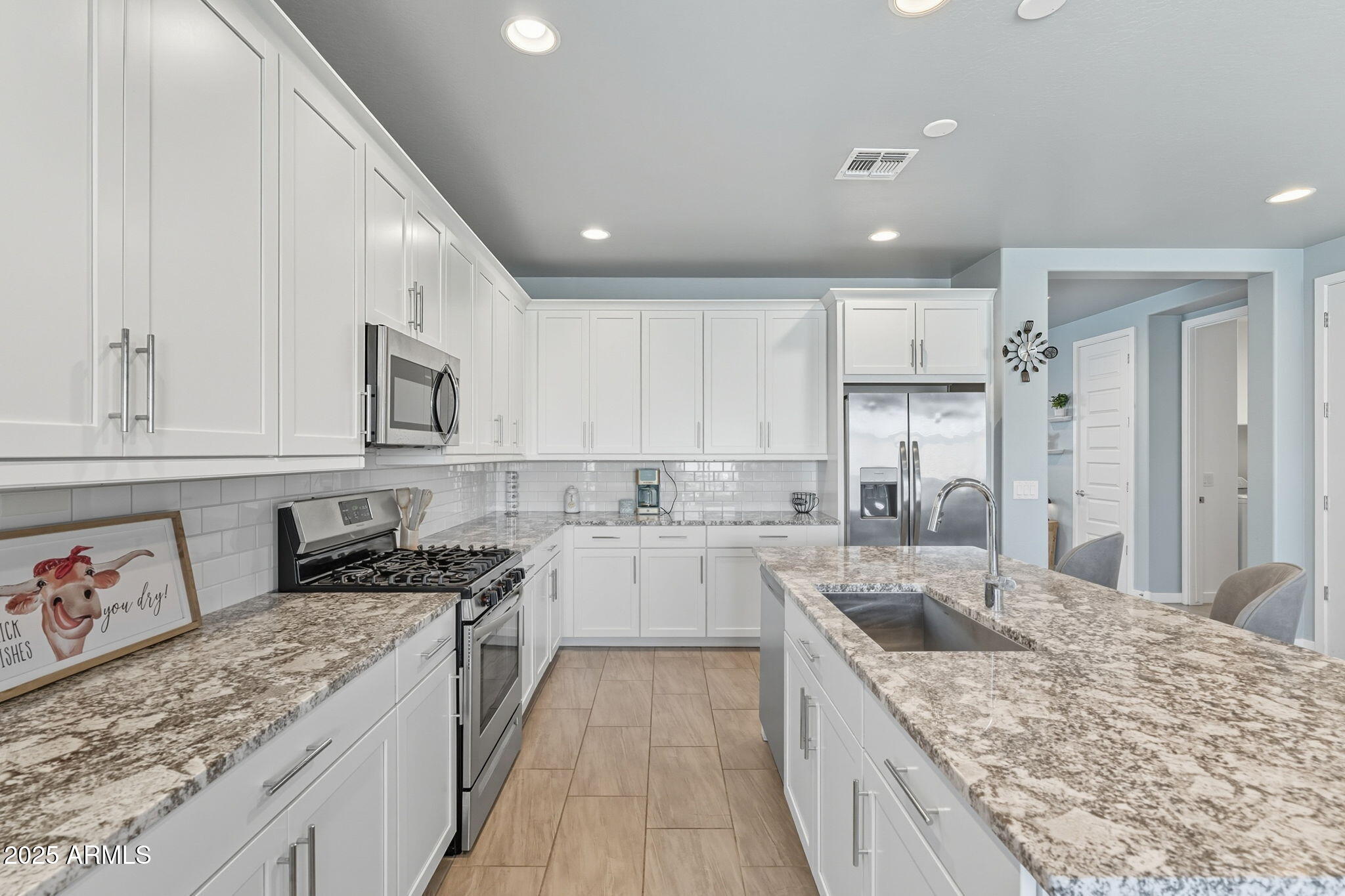 12404 East Soloman Road Gold Canyon, AZ 85118 - Photo 19 of 47 a kitchen with a sink stove top oven and refrigerator