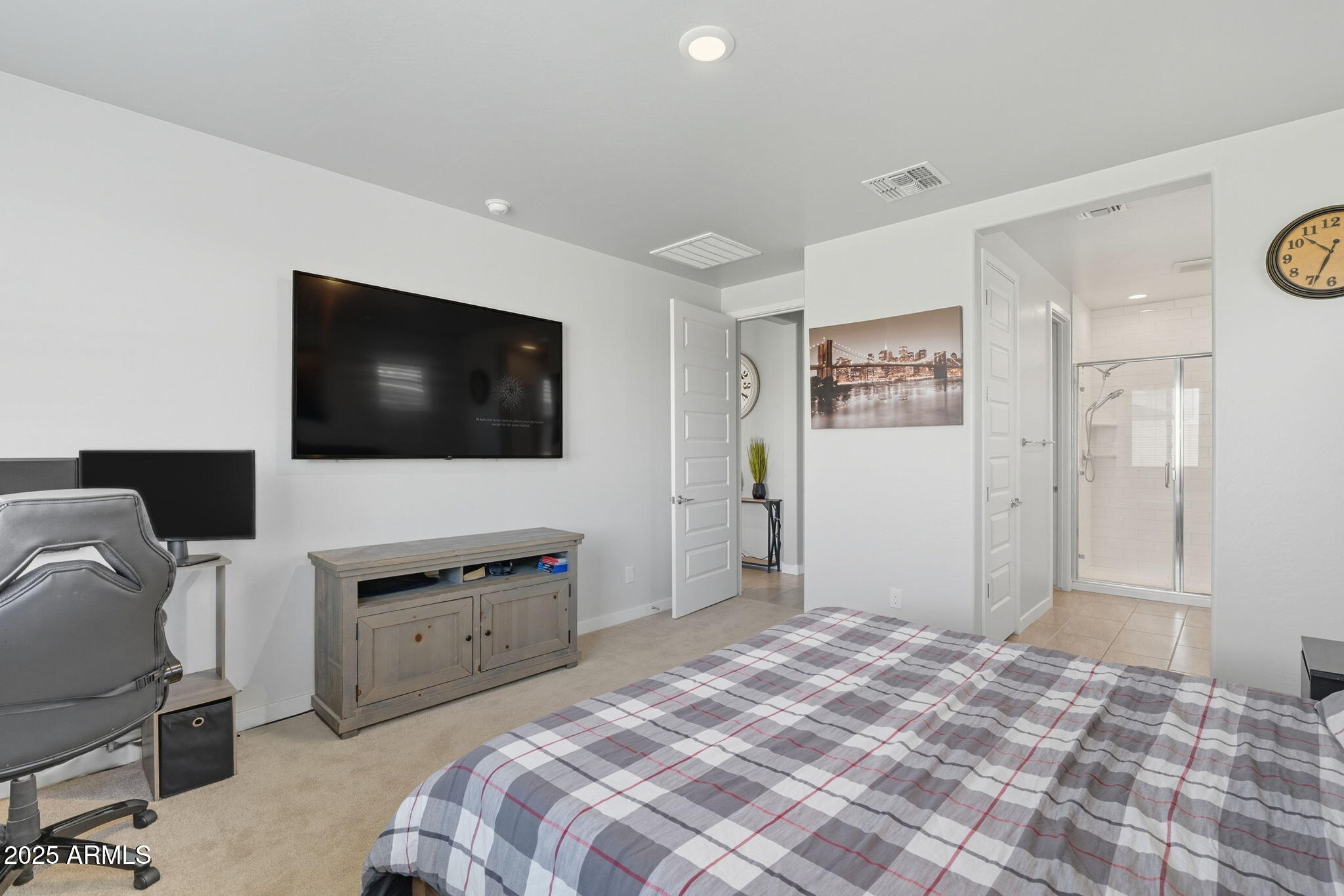 12404 East Soloman Road Gold Canyon, AZ 85118 - Photo 21 of 47 a bedroom with a bed and a flat screen tv