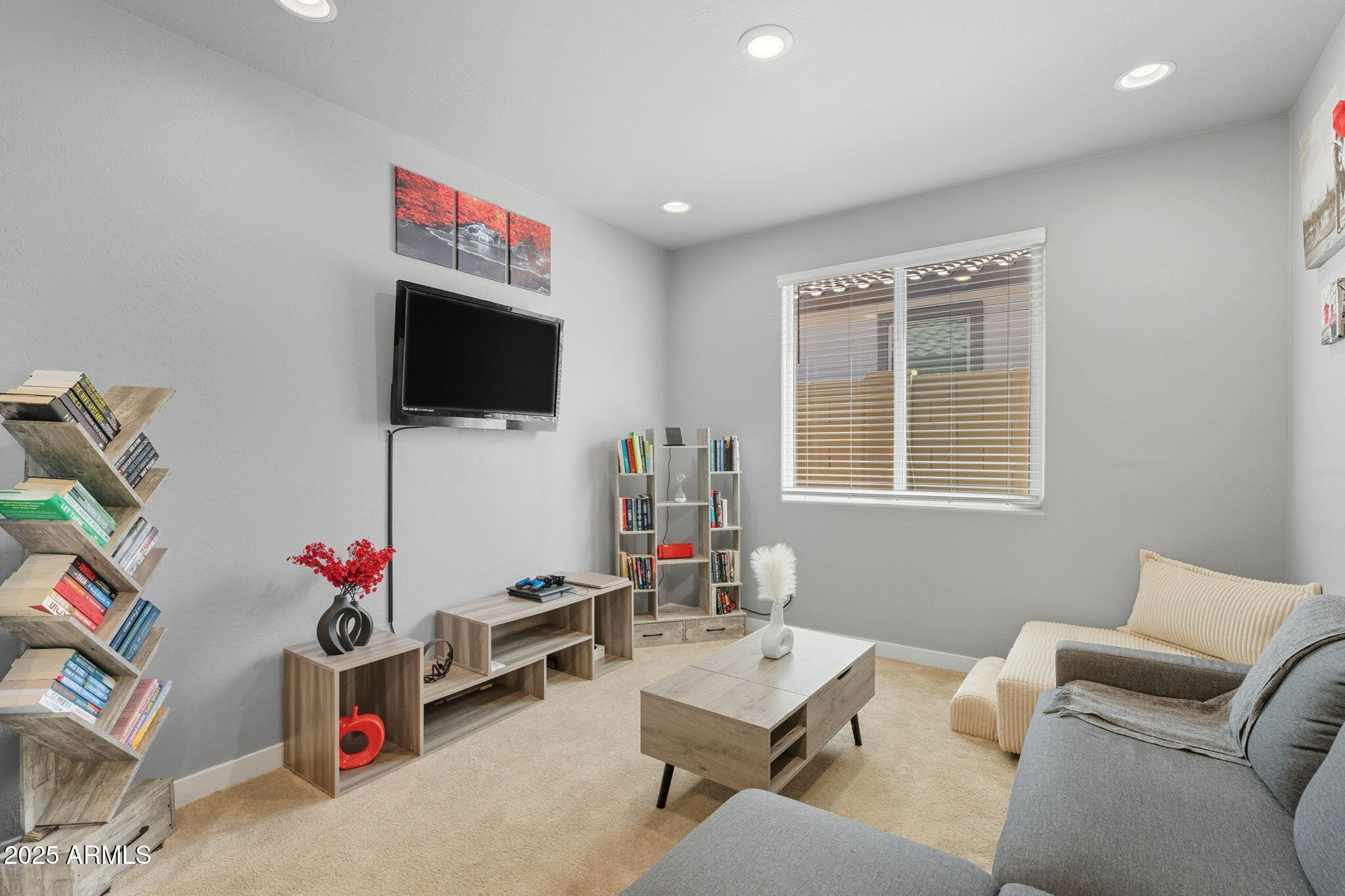 12404 East Soloman Road Gold Canyon, AZ 85118 - Photo 24 of 47 a living room with furniture and a flat screen tv