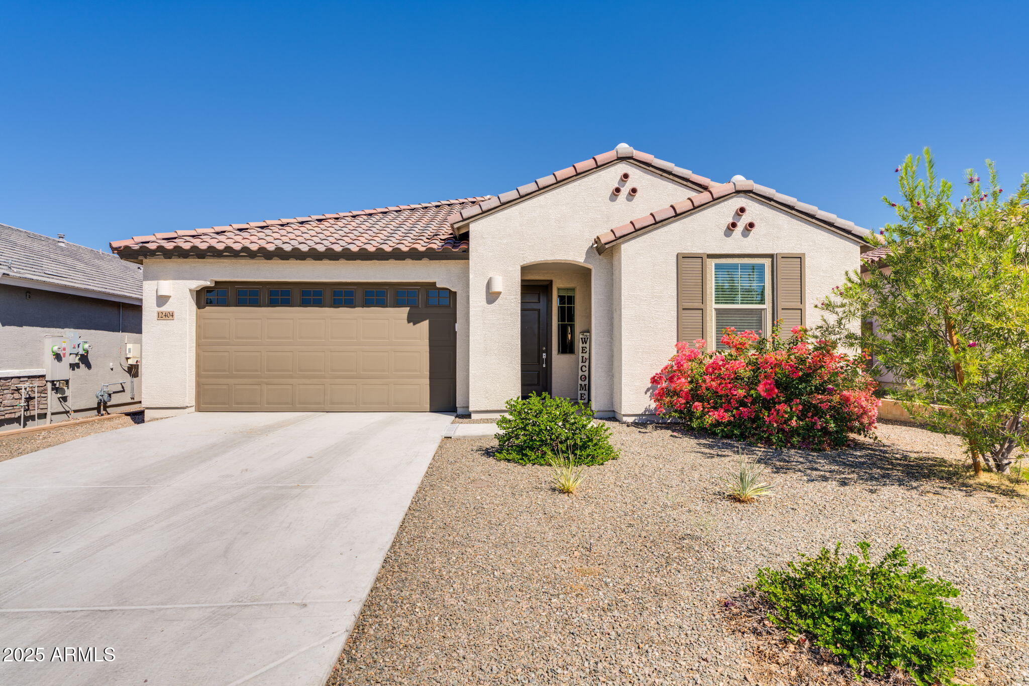 12404 East Soloman Road Gold Canyon, AZ 85118 - Photo 2 of 47 a view of a house with a yard and garage