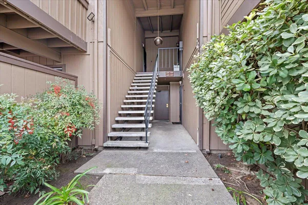 a view of entryway with wooden floor