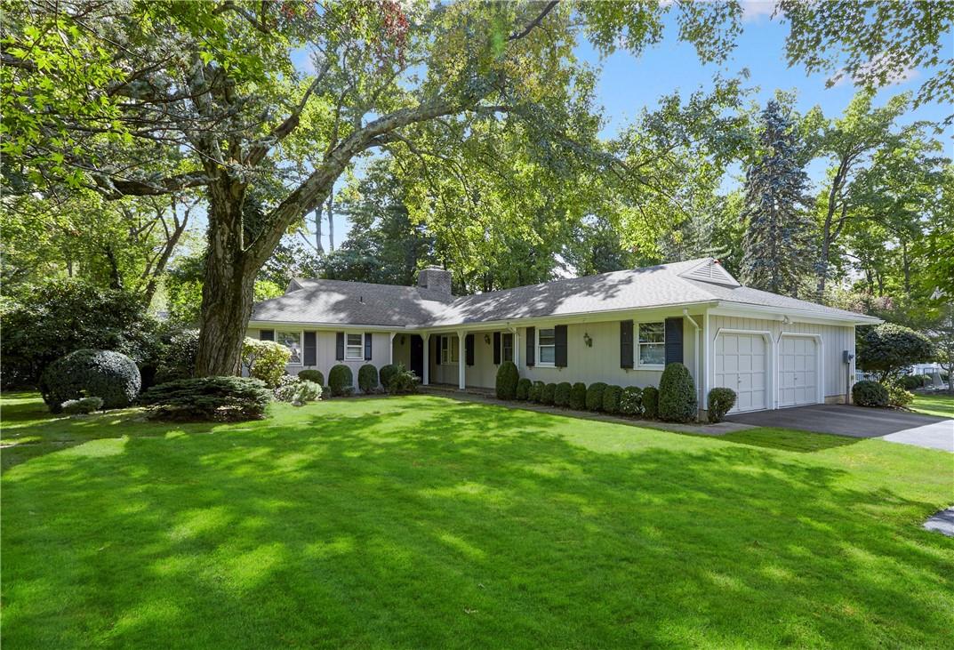 6 John Jay Place Rye, NY 10580 - Photo 1 of 1 a view of a house with a yard