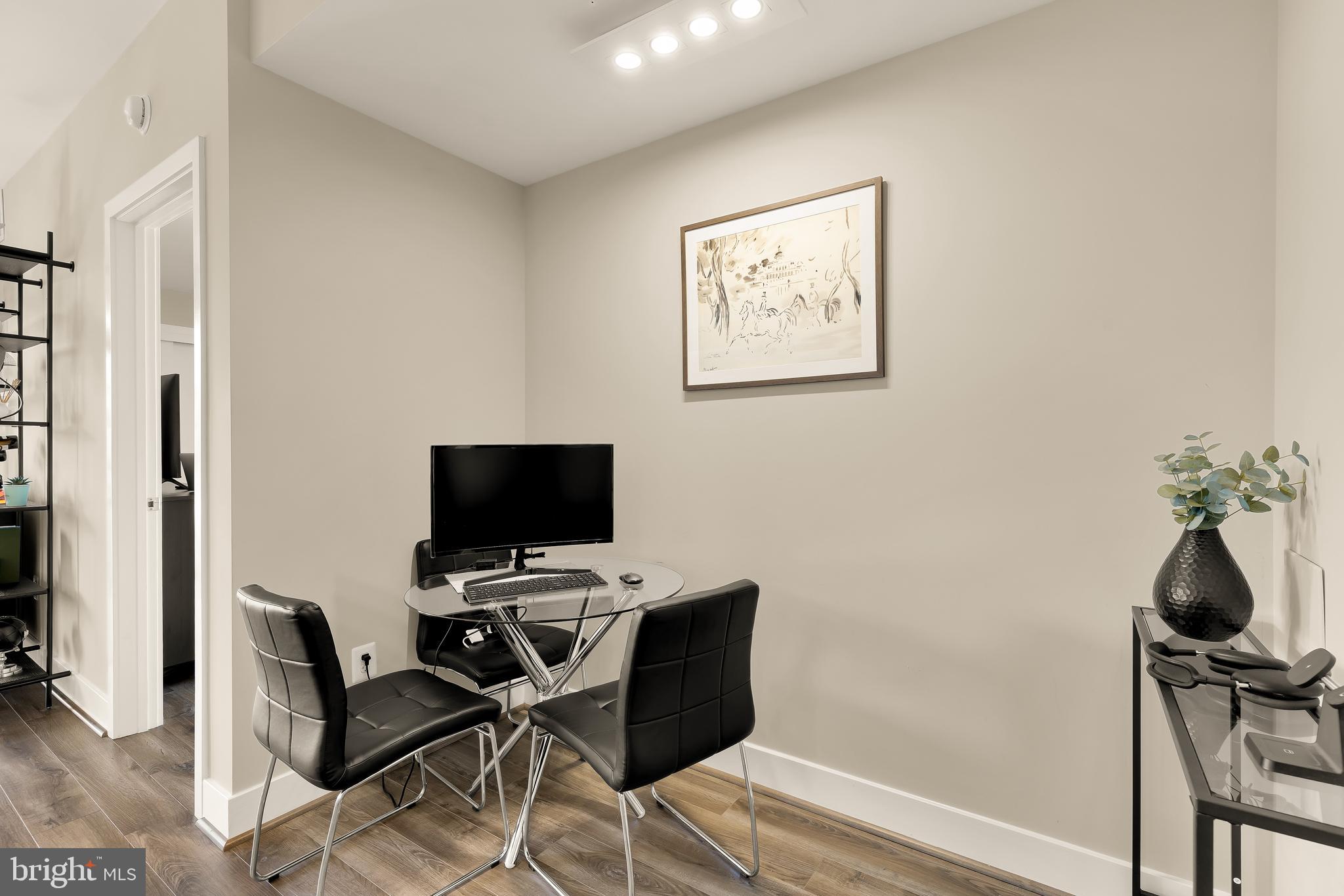 1628 11th Street Northwest, Unit 308 Washington, DC 20001 - Photo 12 of 26 a view of a workspace with furniture and a window