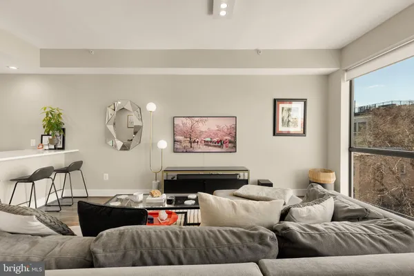 a living room with furniture and a couch