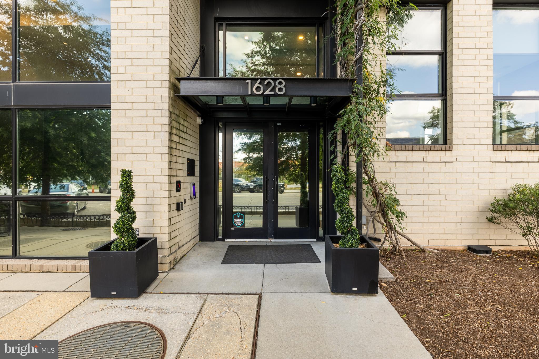 1628 11th Street Northwest, Unit 308 Washington, DC 20001 - Photo 20 of 26 a view of a entryway door front of house