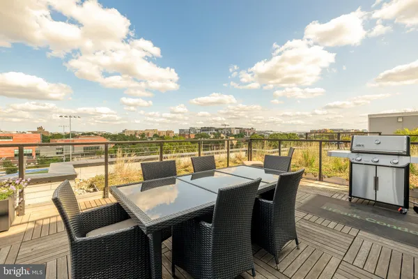 a view of a terrace with furniture