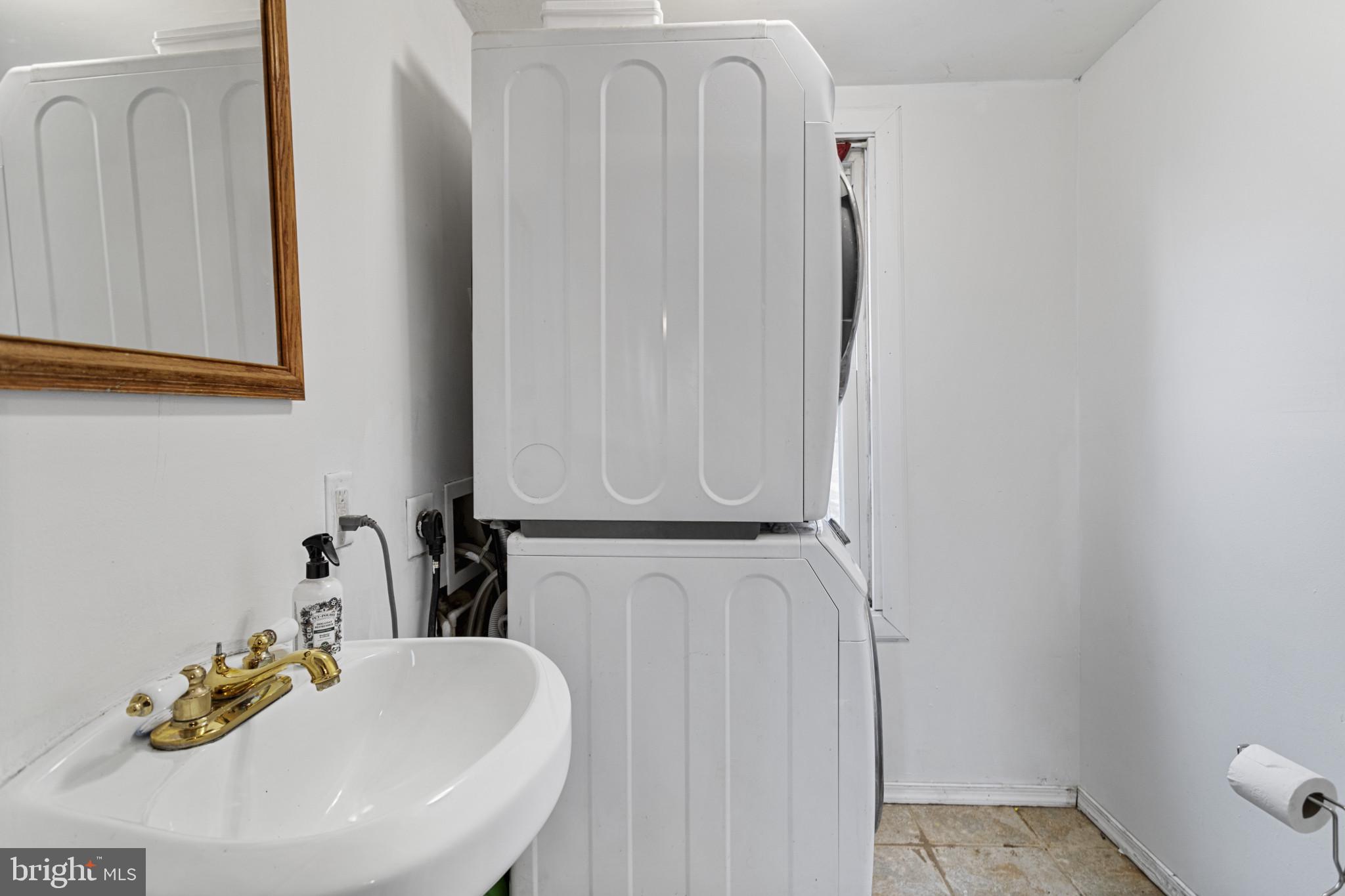 141 West King Street Littlestown, PA 17340 - Photo 24 of 31 a bathroom with a sink and a mirror