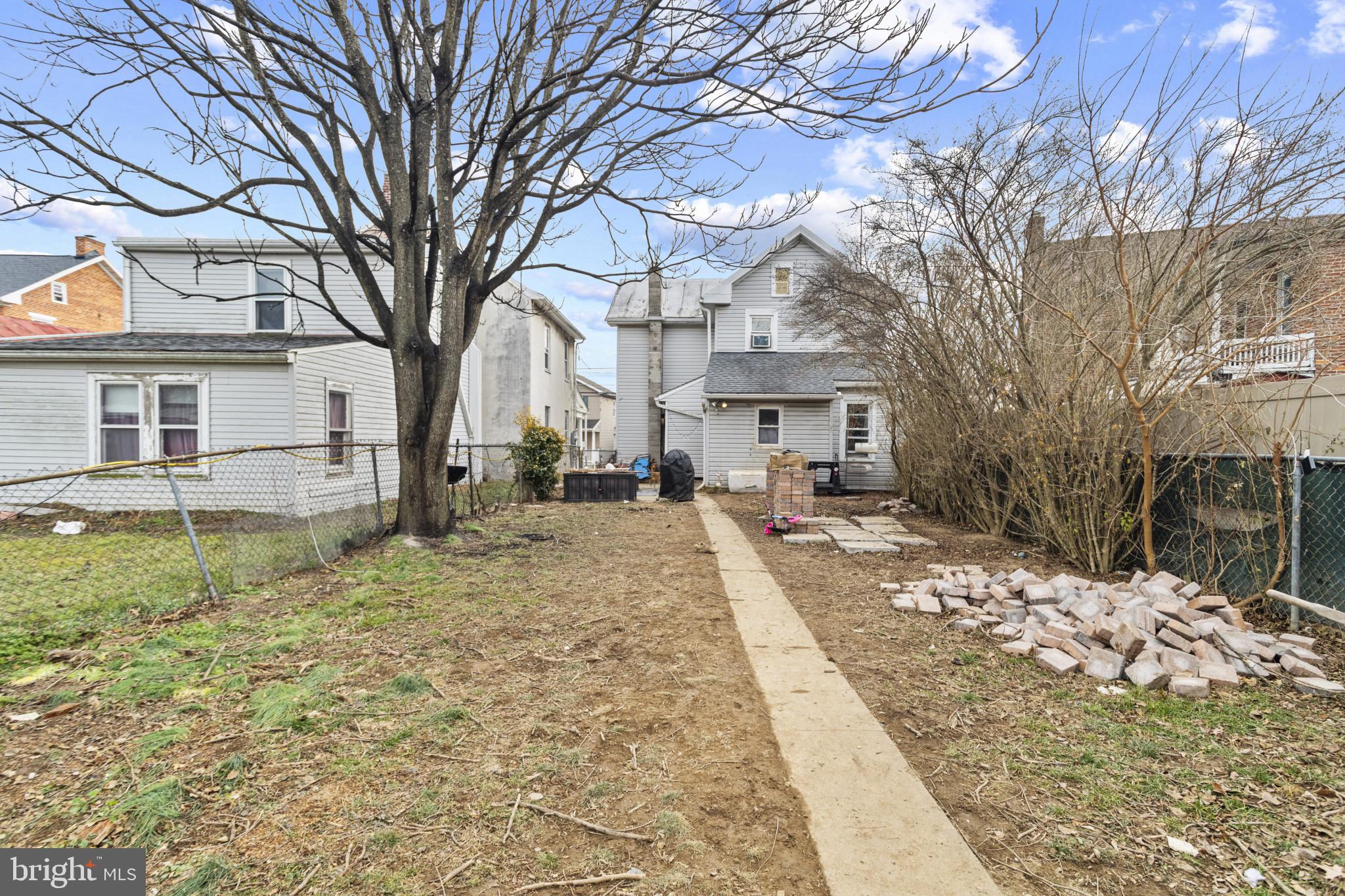 141 West King Street Littlestown, PA 17340 - Photo 30 of 31 a view of a yard with a large tree