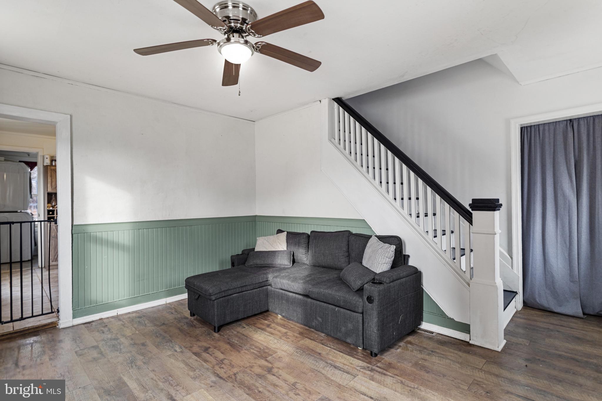 141 West King Street Littlestown, PA 17340 - Photo 6 of 31 a living room with furniture and a wooden floor