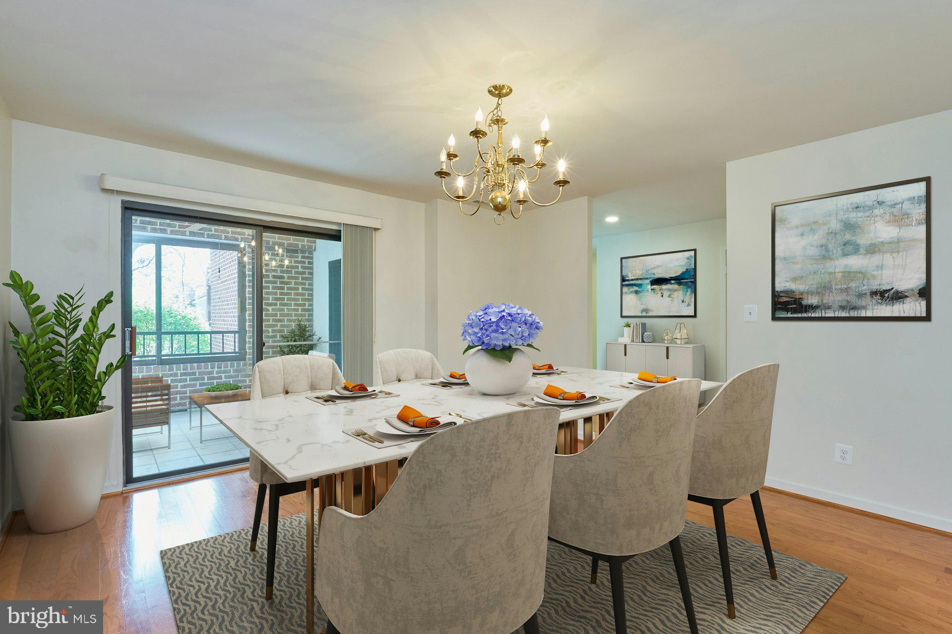 11500 Fairway Drive, Unit 101 Reston, VA 20190 - Photo 12 of 40 a view of a dining room with furniture and wooden floor