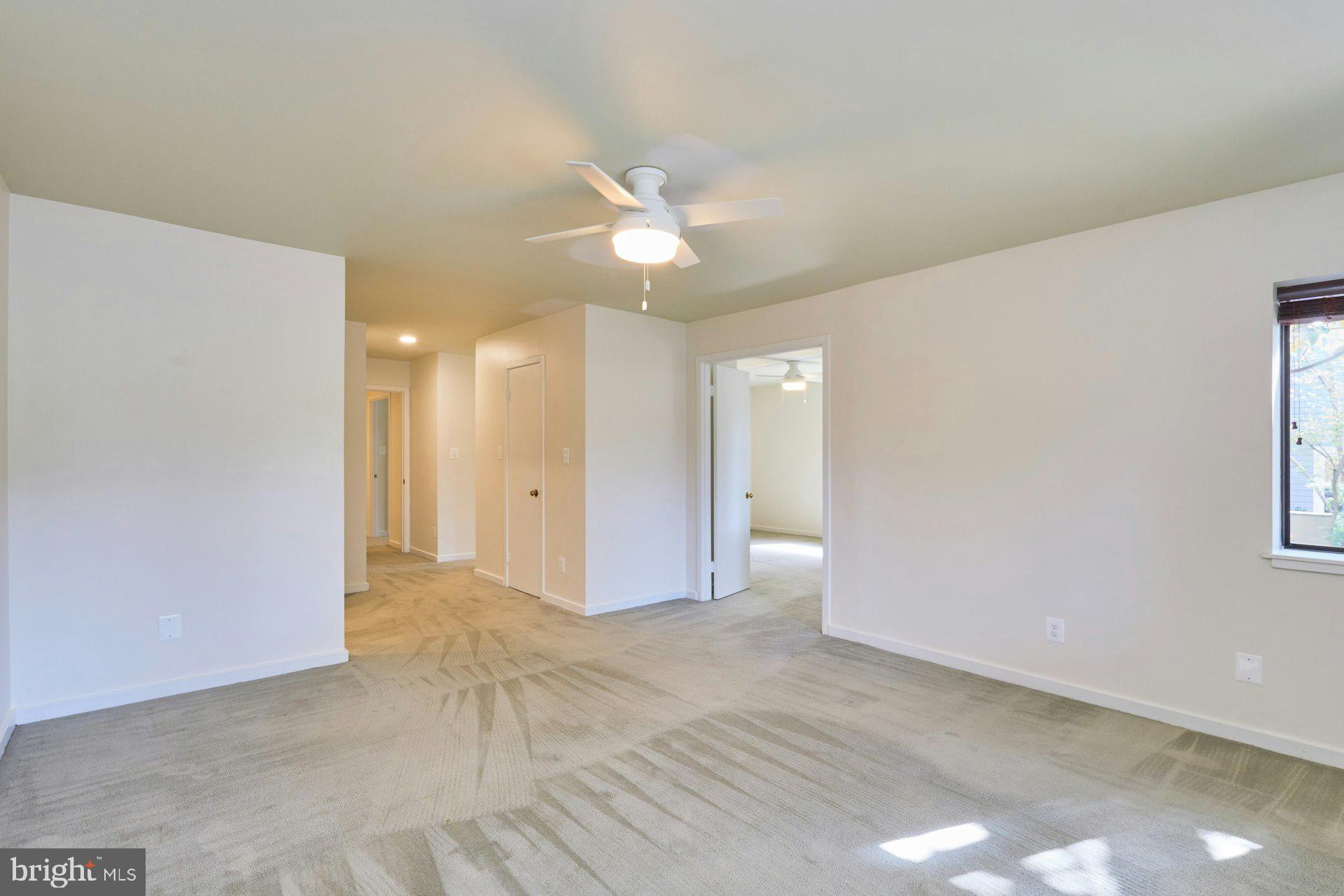 11500 Fairway Drive, Unit 101 Reston, VA 20190 - Photo 26 of 40 a view of empty room with a ceiling fan