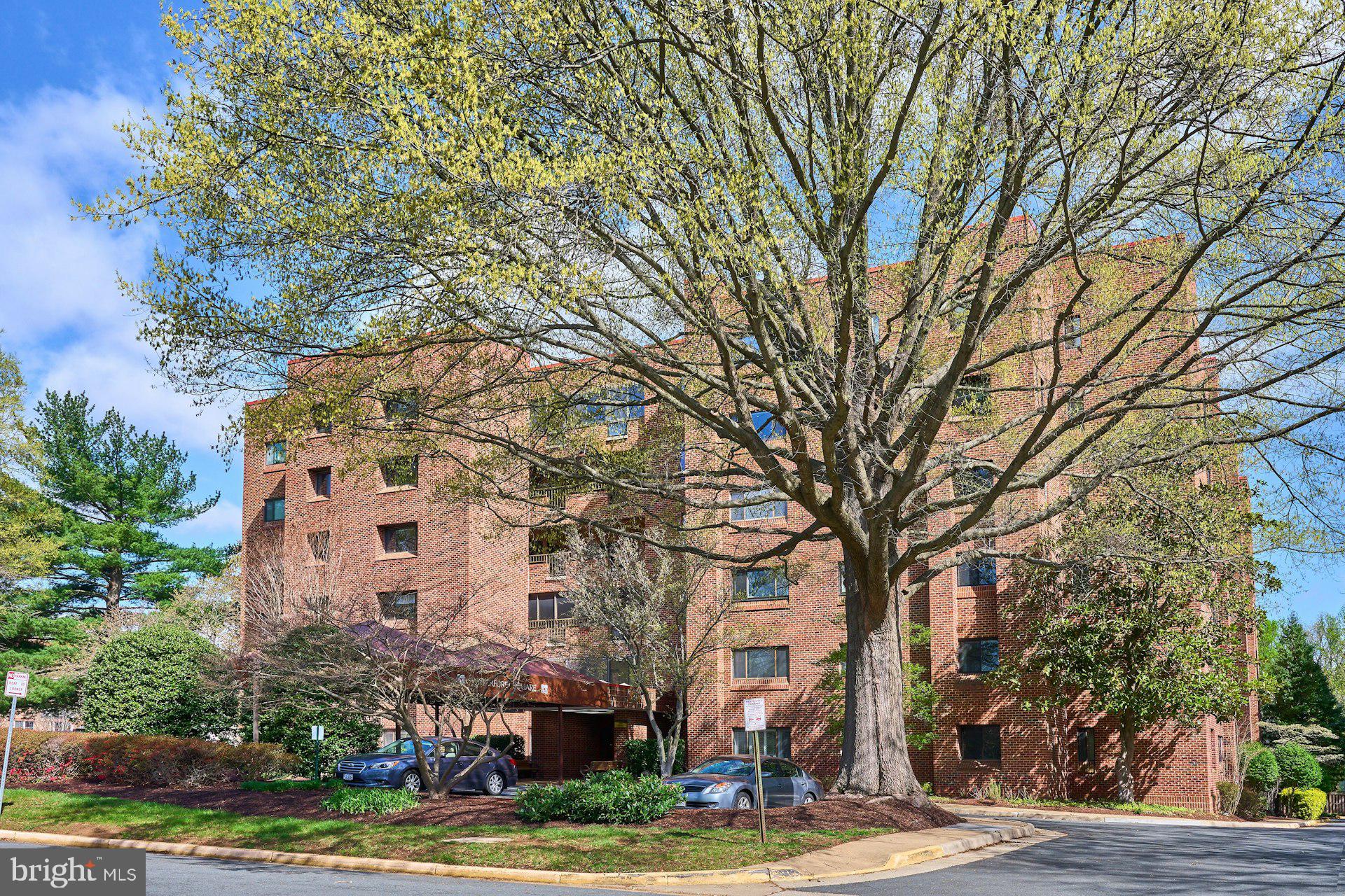 11500 Fairway Drive, Unit 101 Reston, VA 20190 - Photo 3 of 40 front view of residential houses with yard