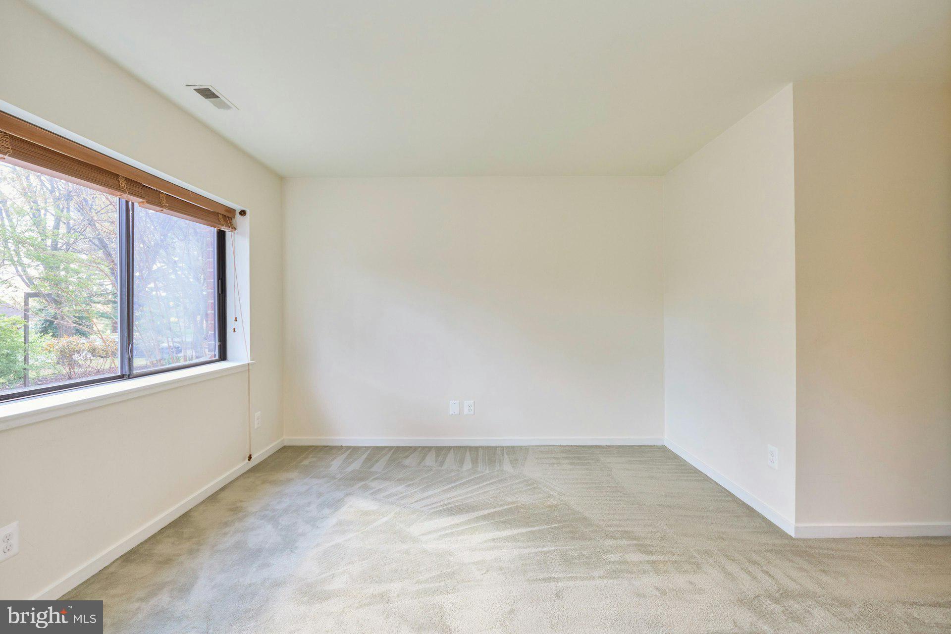 11500 Fairway Drive, Unit 101 Reston, VA 20190 - Photo 31 of 40 an empty room with a window
