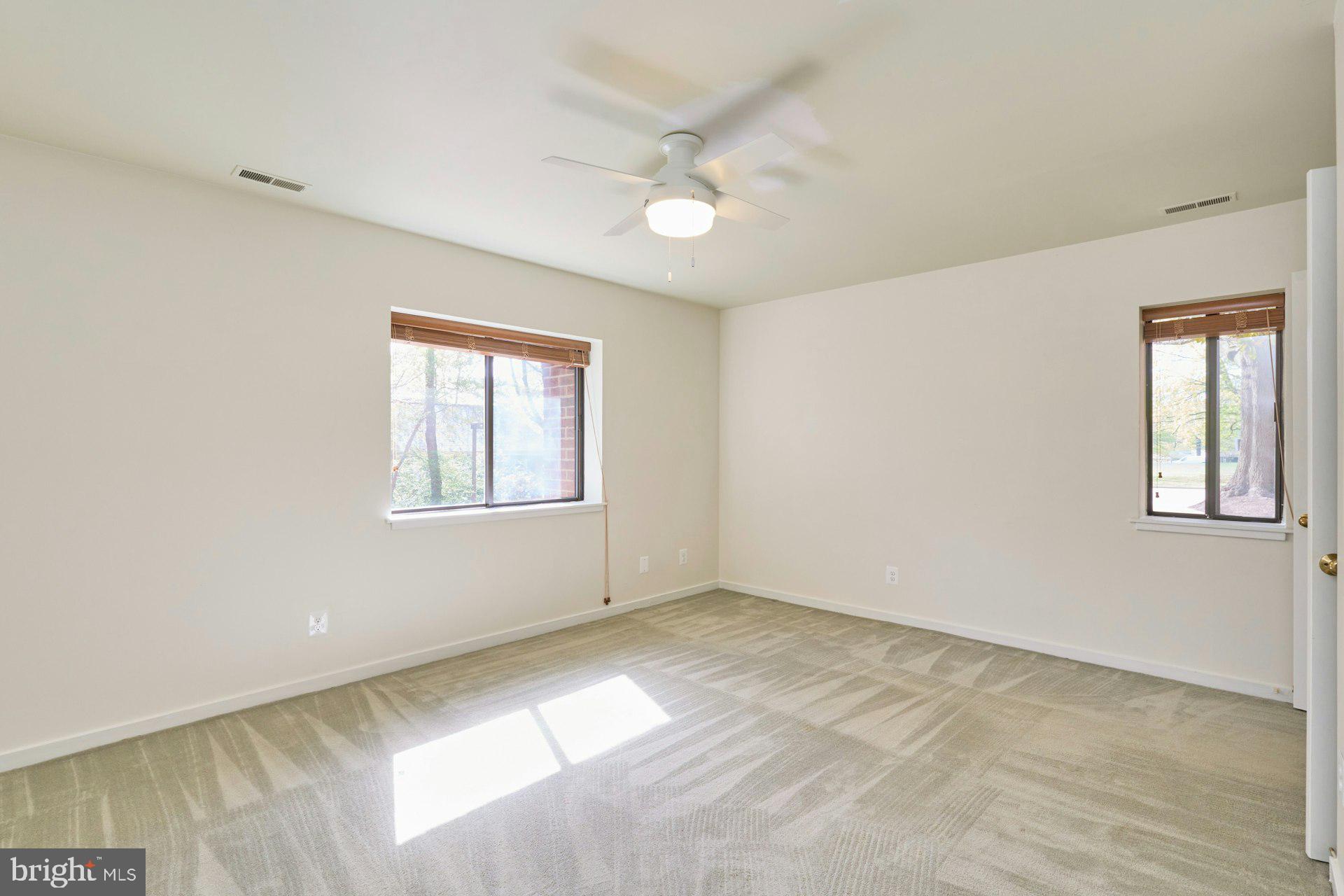 11500 Fairway Drive, Unit 101 Reston, VA 20190 - Photo 32 of 40 a view of an empty room with a window