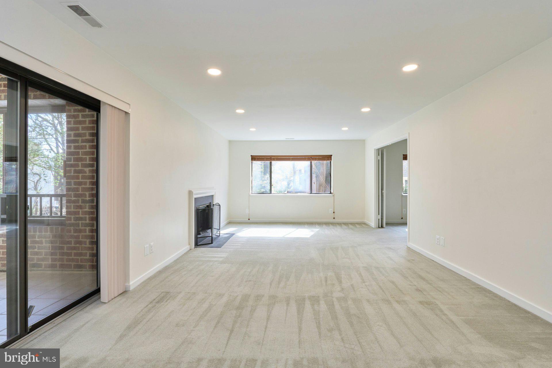 11500 Fairway Drive, Unit 101 Reston, VA 20190 - Photo 9 of 40 a view of an empty room with a window