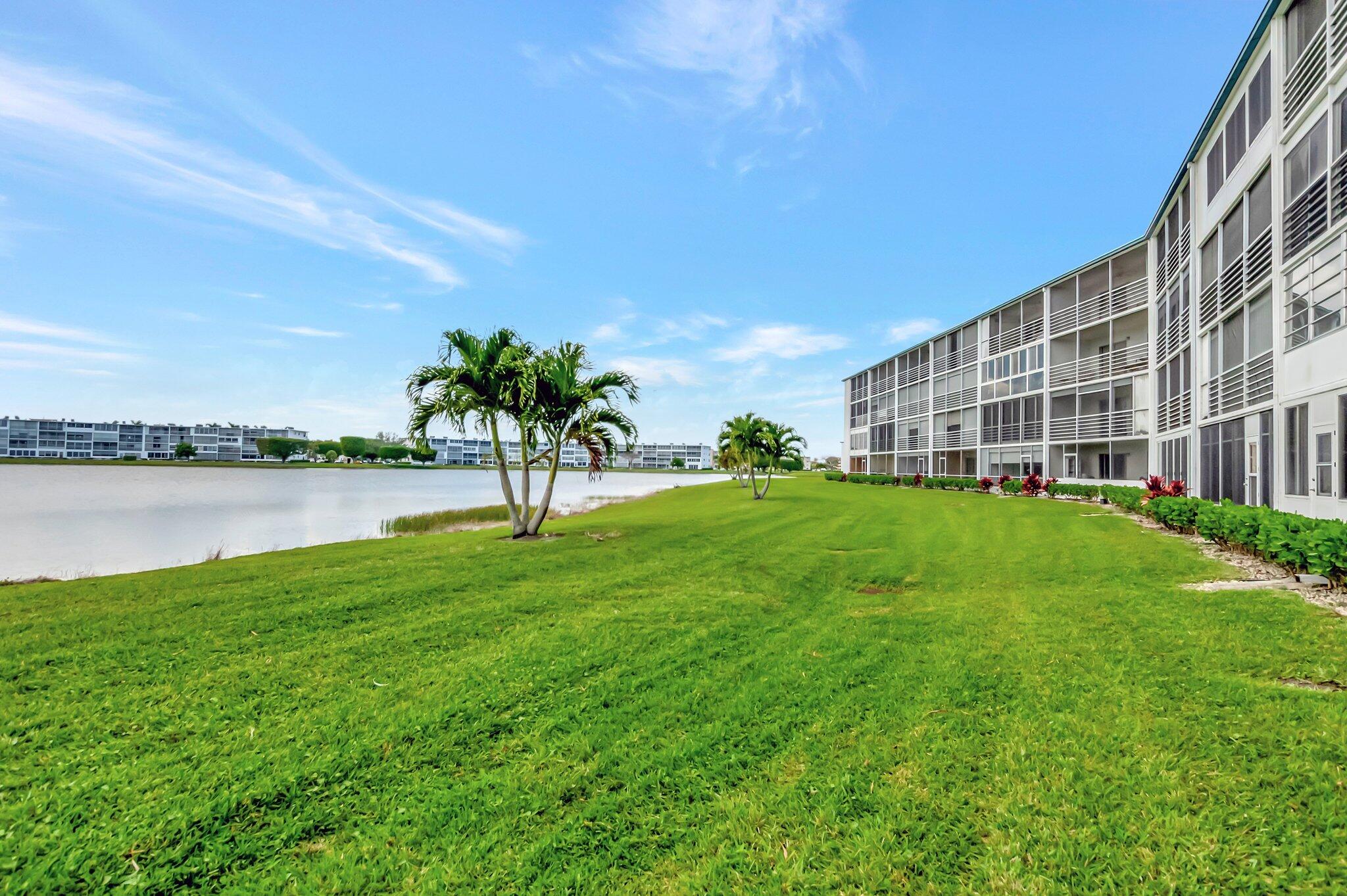 1080 Exeter Boca Raton, FL 33434 - Photo 15 of 37 a view of building with river in front of it