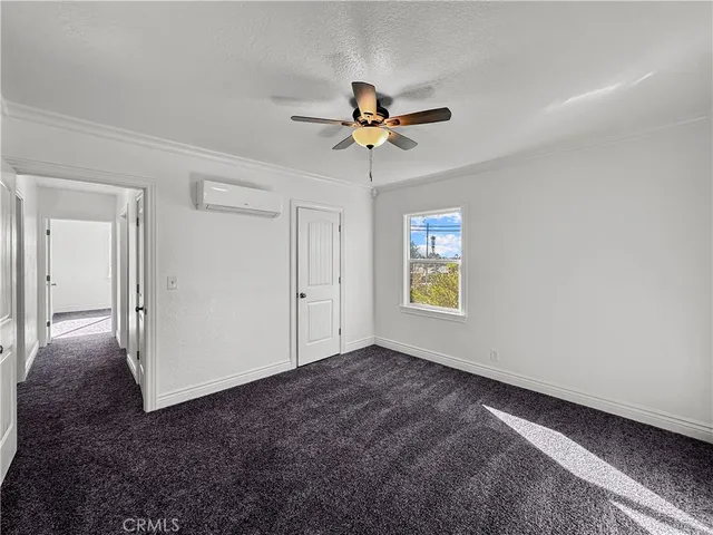 a bathroom with a sink toilet vanity and tub