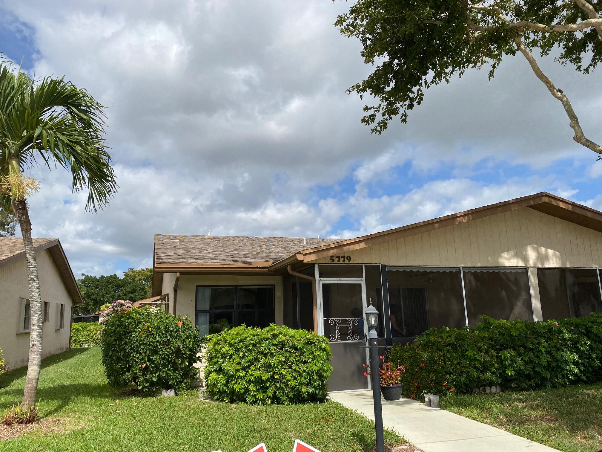 5779 Doris Court Delray Beach, FL 33484 - Photo 1 of 37 END UNIT TOWNHOME