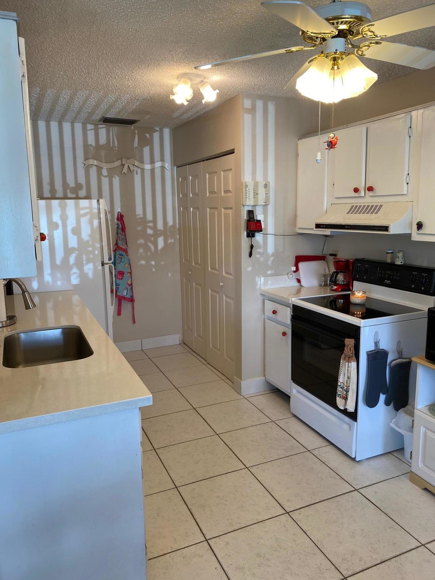 5779 Doris Court Delray Beach, FL 33484 - Photo 12 of 37 kitchen 1