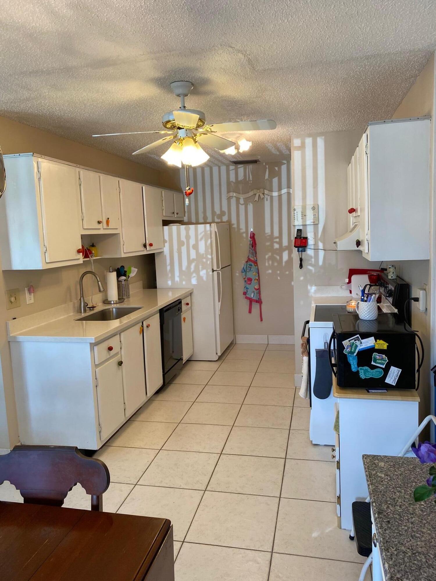 5779 Doris Court Delray Beach, FL 33484 - Photo 13 of 37 kitchen