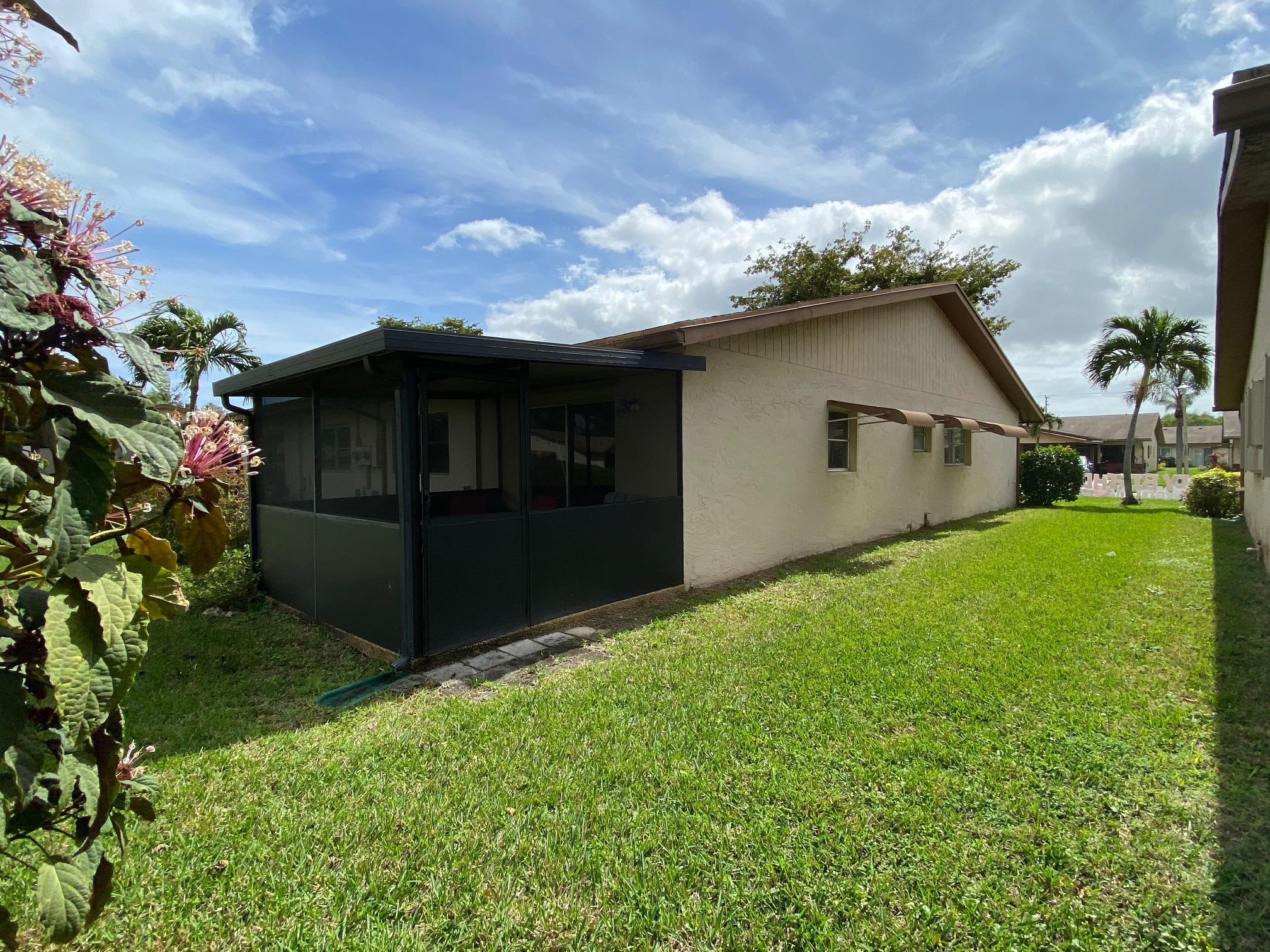 5779 Doris Court Delray Beach, FL 33484 - Photo 4 of 37 Side view