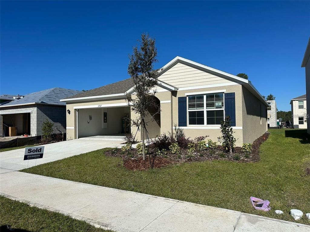 3767 Paragon Lane Clermont, FL 34714 - Photo 1 of 19 a front view of house with yard