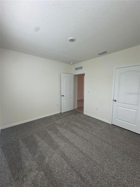 3767 Paragon Lane Clermont, FL 34714 - Photo 18 of 19 a view of an empty room and entryway