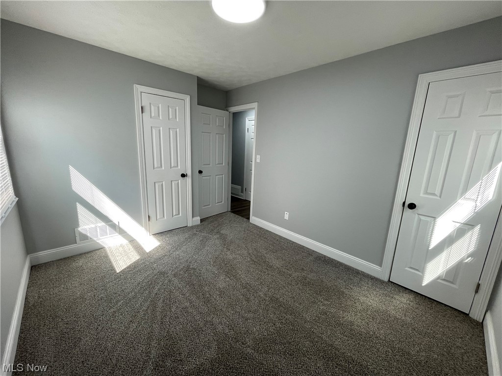 1857 Sterling Road Madison, OH 44057 - Photo 21 of 33 Bedroom with dark carpet