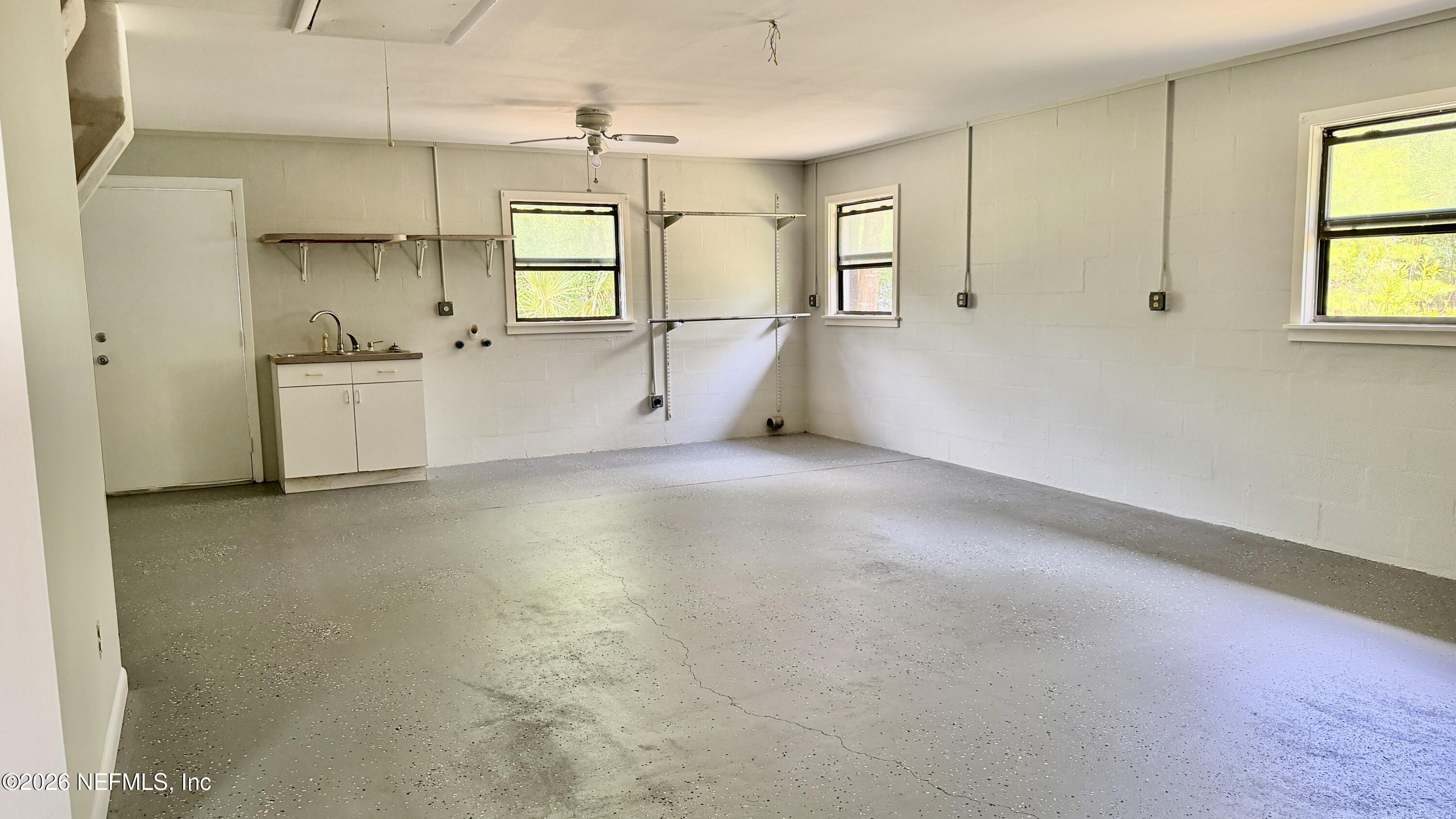 850 Cousintown Road Interlachen, FL 32148 - Photo 16 of 27 a view of a kitchen with a sink and a window