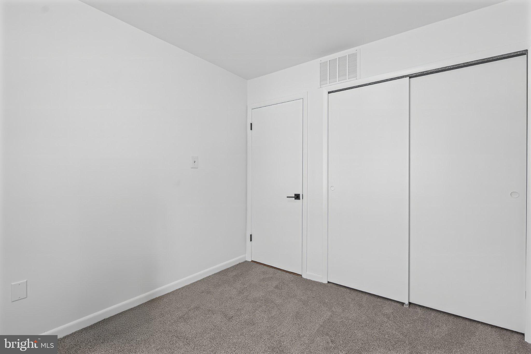 1317 Roxboro Road Baltimore, MD 21237 - Photo 15 of 30 Bright and airy minimalist space.