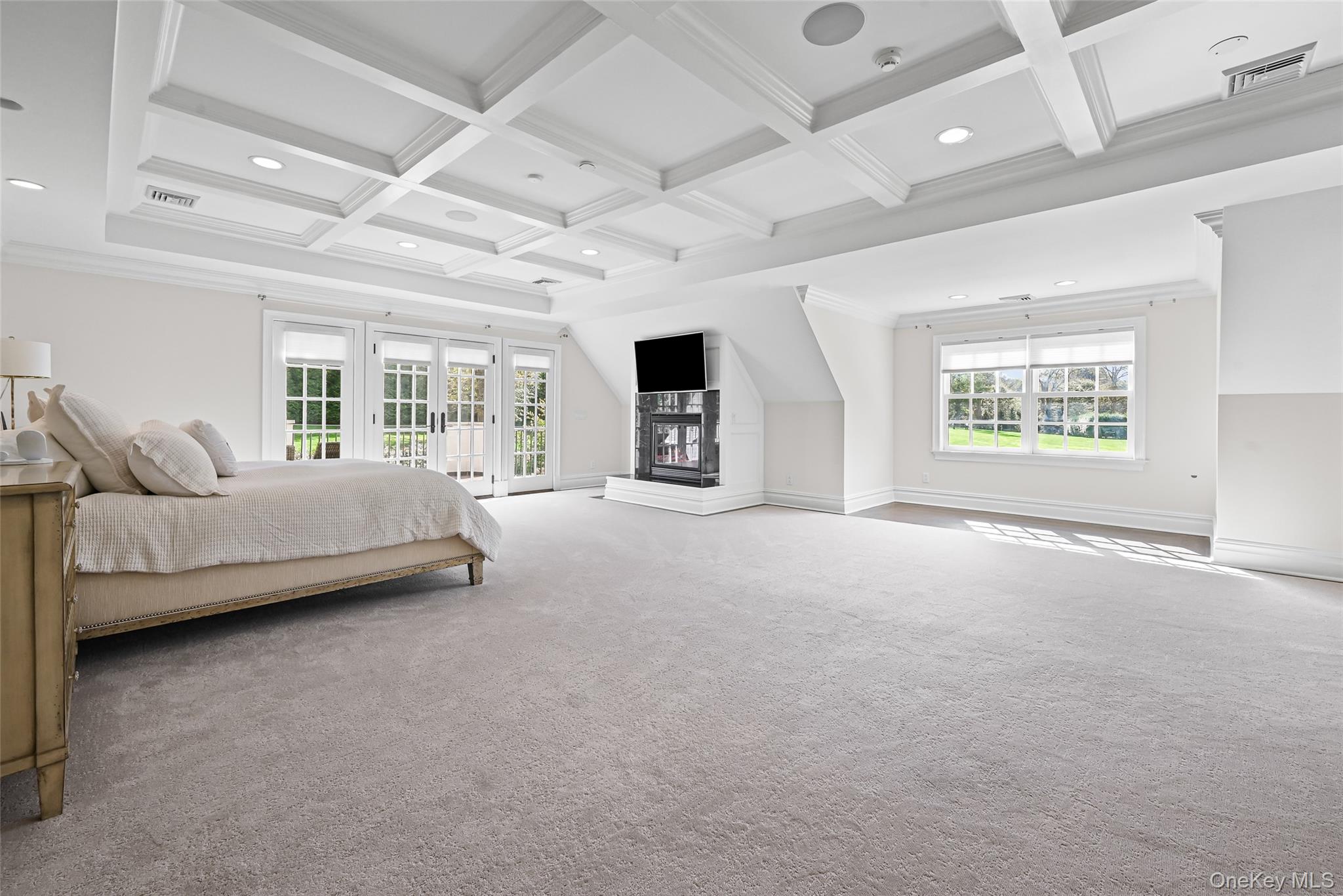 15 High Ridge Lane Oyster Bay, NY 11771 - Photo 11 of 25 a view of a livingroom with furniture and windows