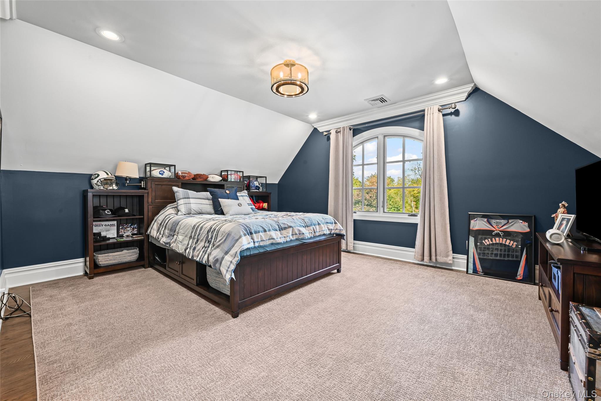 15 High Ridge Lane Oyster Bay, NY 11771 - Photo 12 of 25 a bedroom with a bed and a window