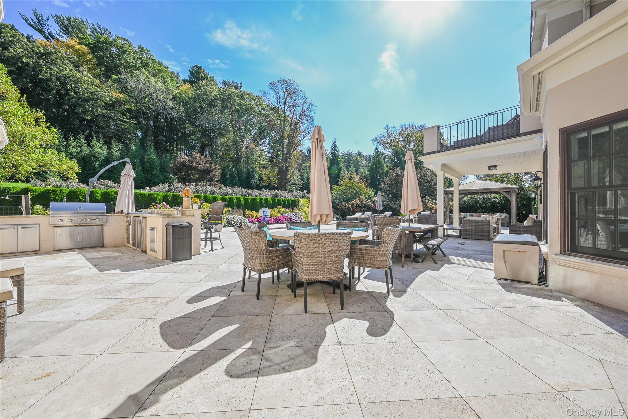 15 High Ridge Lane Oyster Bay, NY 11771 - Photo 18 of 25 a view of a patio with swimming pool