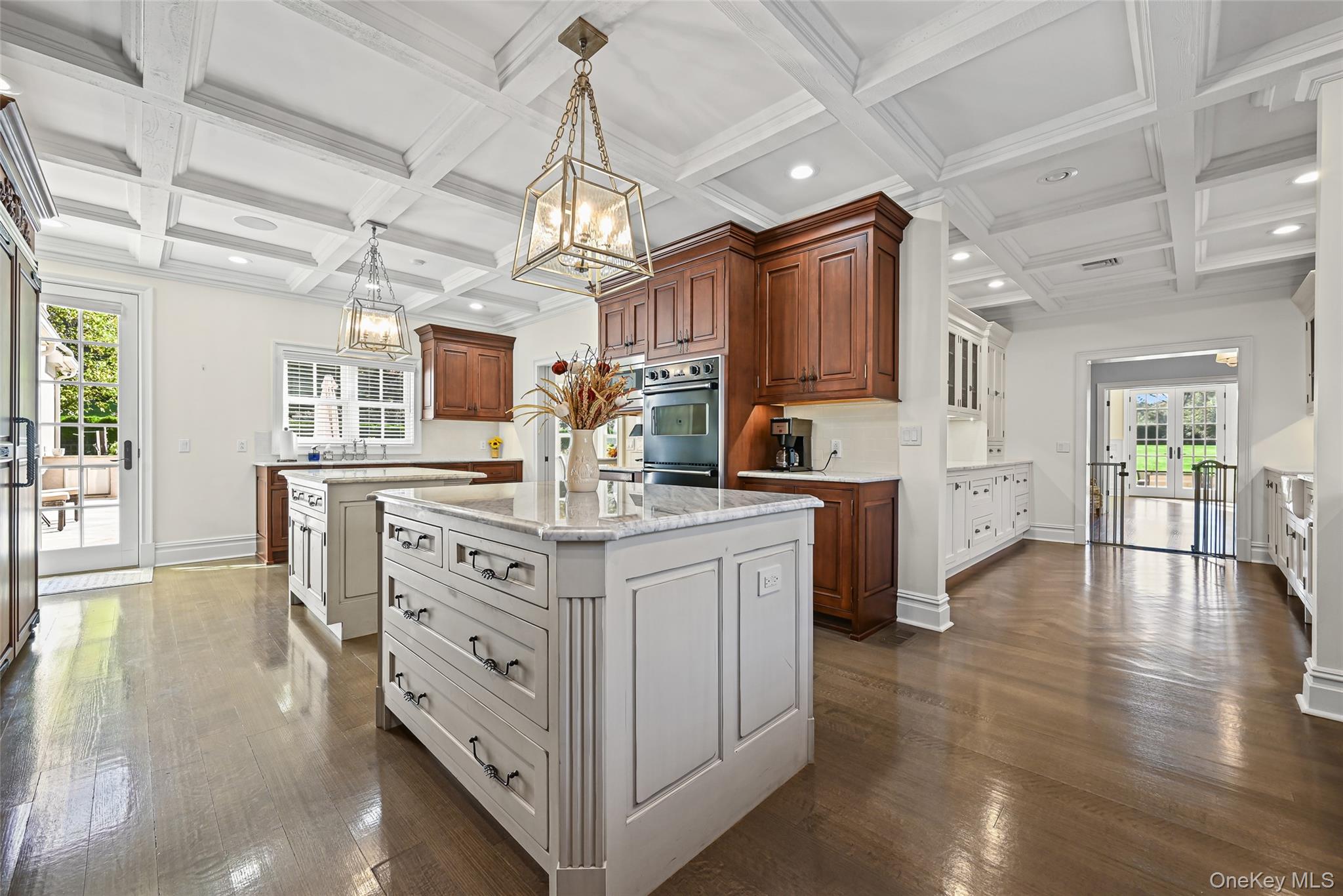 15 High Ridge Lane Oyster Bay, NY 11771 - Photo 2 of 25 a kitchen with stainless steel appliances granite countertop a lot of counter space and wooden floors