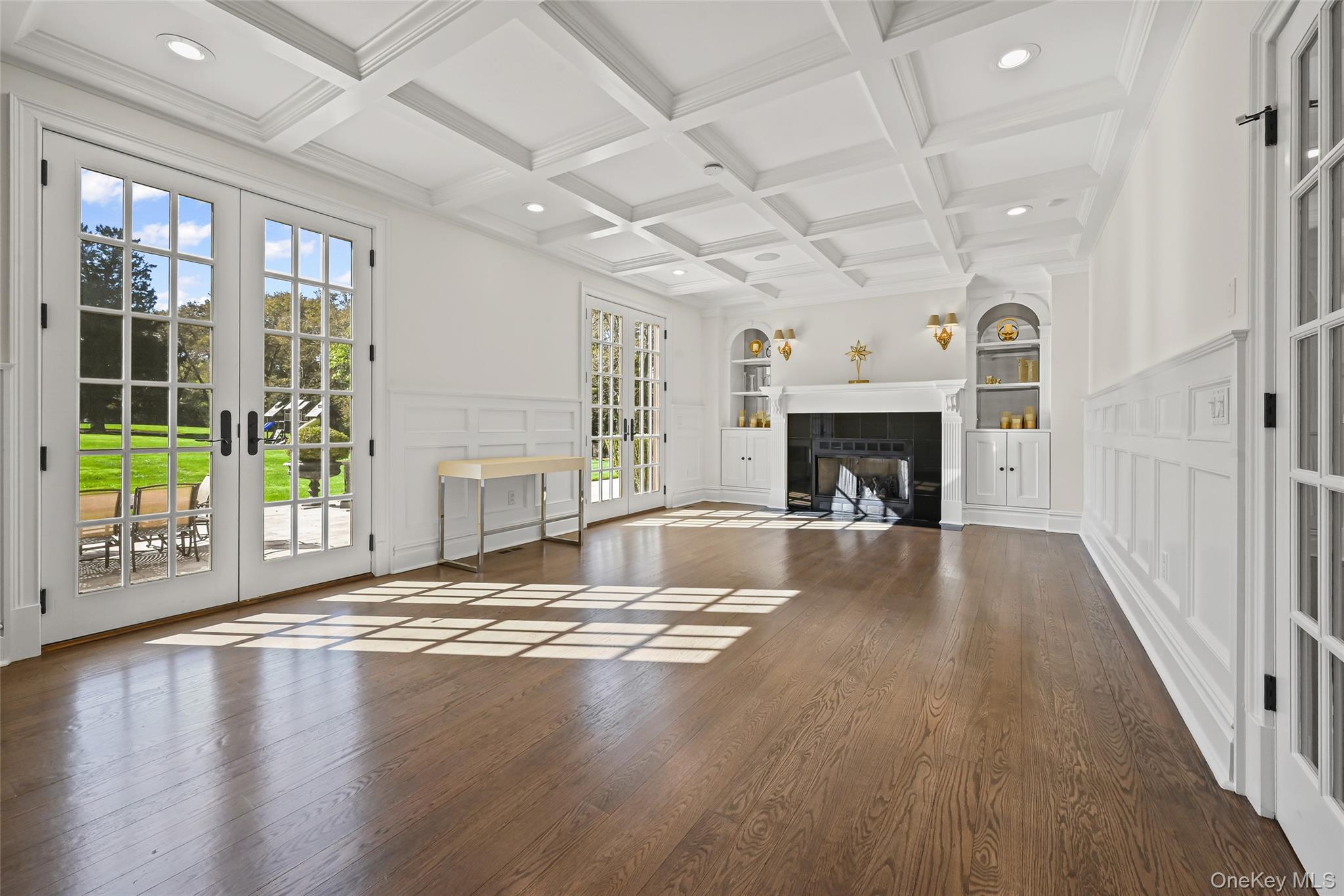 15 High Ridge Lane Oyster Bay, NY 11771 - Photo 5 of 25 a view of an empty room with window and fire place