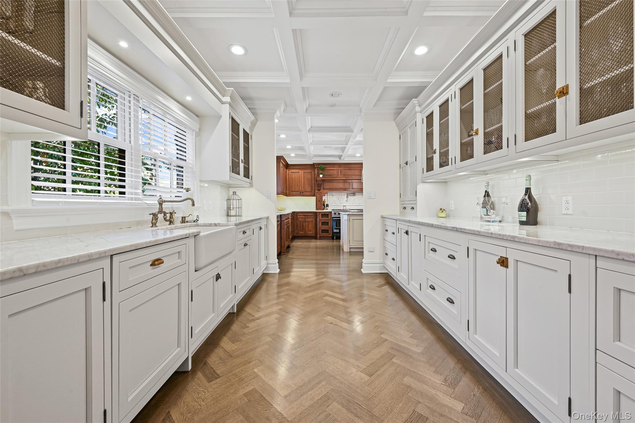 15 High Ridge Lane Oyster Bay, NY 11771 - Photo 9 of 25 a large white kitchen with a large window