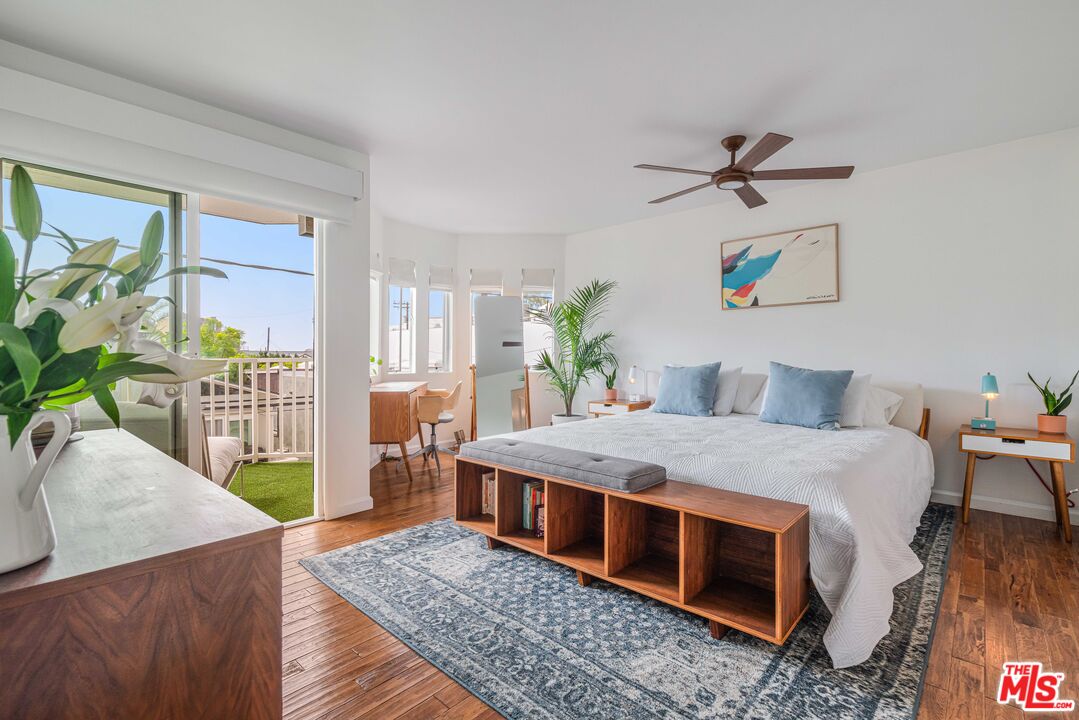 24 Westwind Street, Unit C Marina del Rey, CA 90292 - Photo 20 of 35 a living room with furniture and a wooden floor