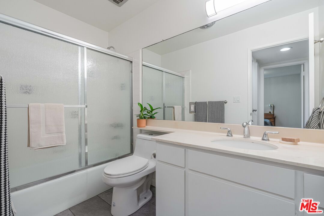 24 Westwind Street, Unit C Marina del Rey, CA 90292 - Photo 26 of 35 a bathroom with a sink a toilet and shower