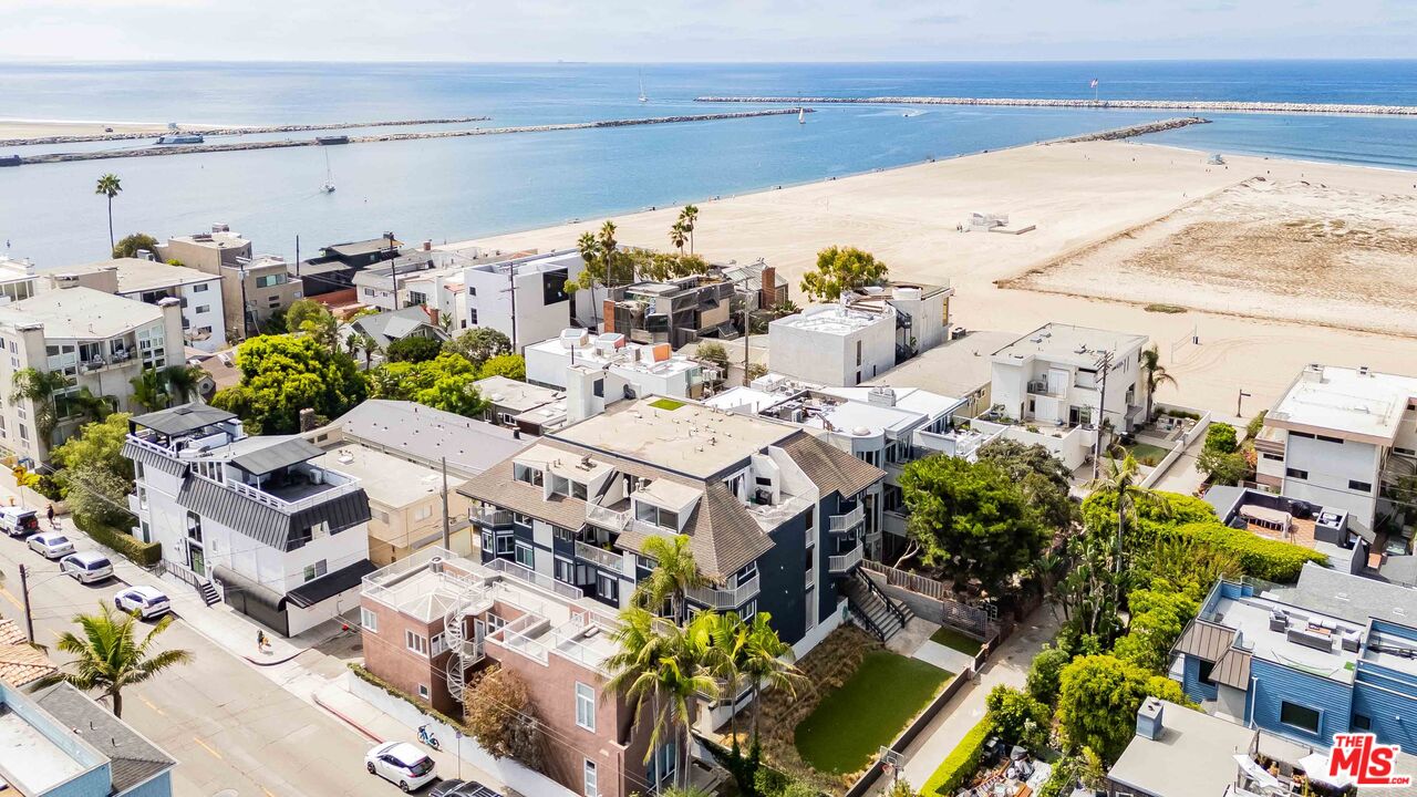 24 Westwind Street, Unit C Marina del Rey, CA 90292 - Photo 29 of 35 a view of building with outdoor space