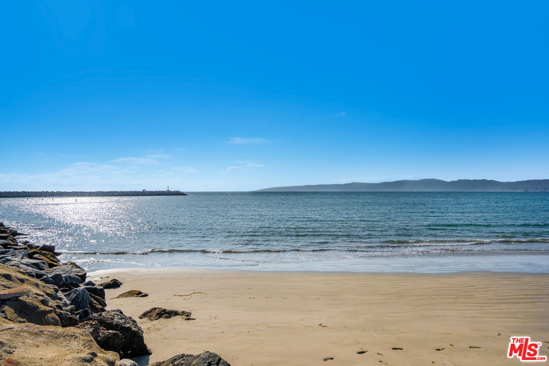 24 Westwind Street, Unit C Marina del Rey, CA 90292 - Photo 32 of 35 a view of an ocean and beach