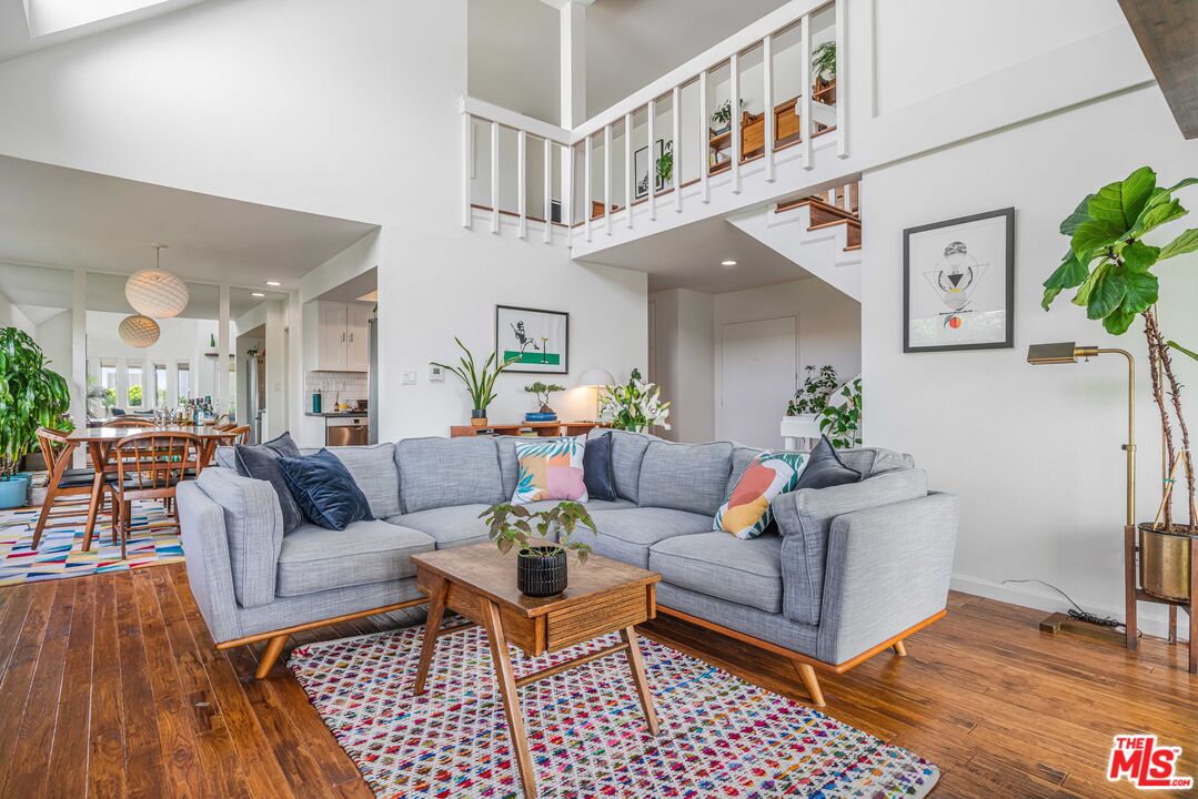 24 Westwind Street, Unit C Marina del Rey, CA 90292 - Photo 8 of 35 a living room with furniture and wooden floor