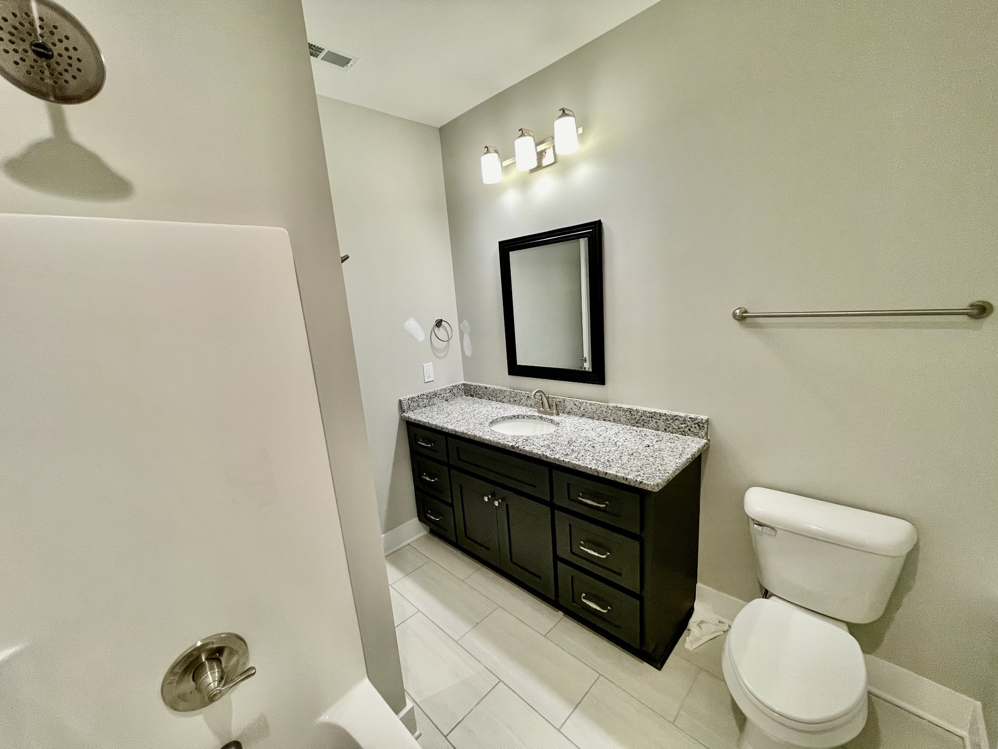 804 Becham Kenneth Circle Smyrna, TN 37167 - Photo 17 of 25 a bathroom with a toilet a sink and mirror