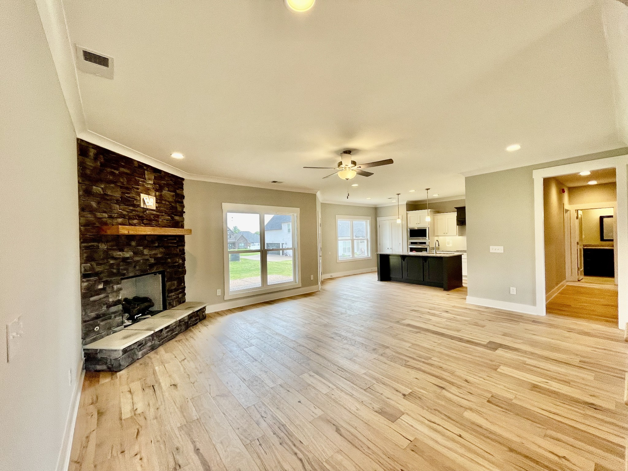 804 Becham Kenneth Circle Smyrna, TN 37167 - Photo 4 of 25 a view of empty room with wooden floor and fireplace