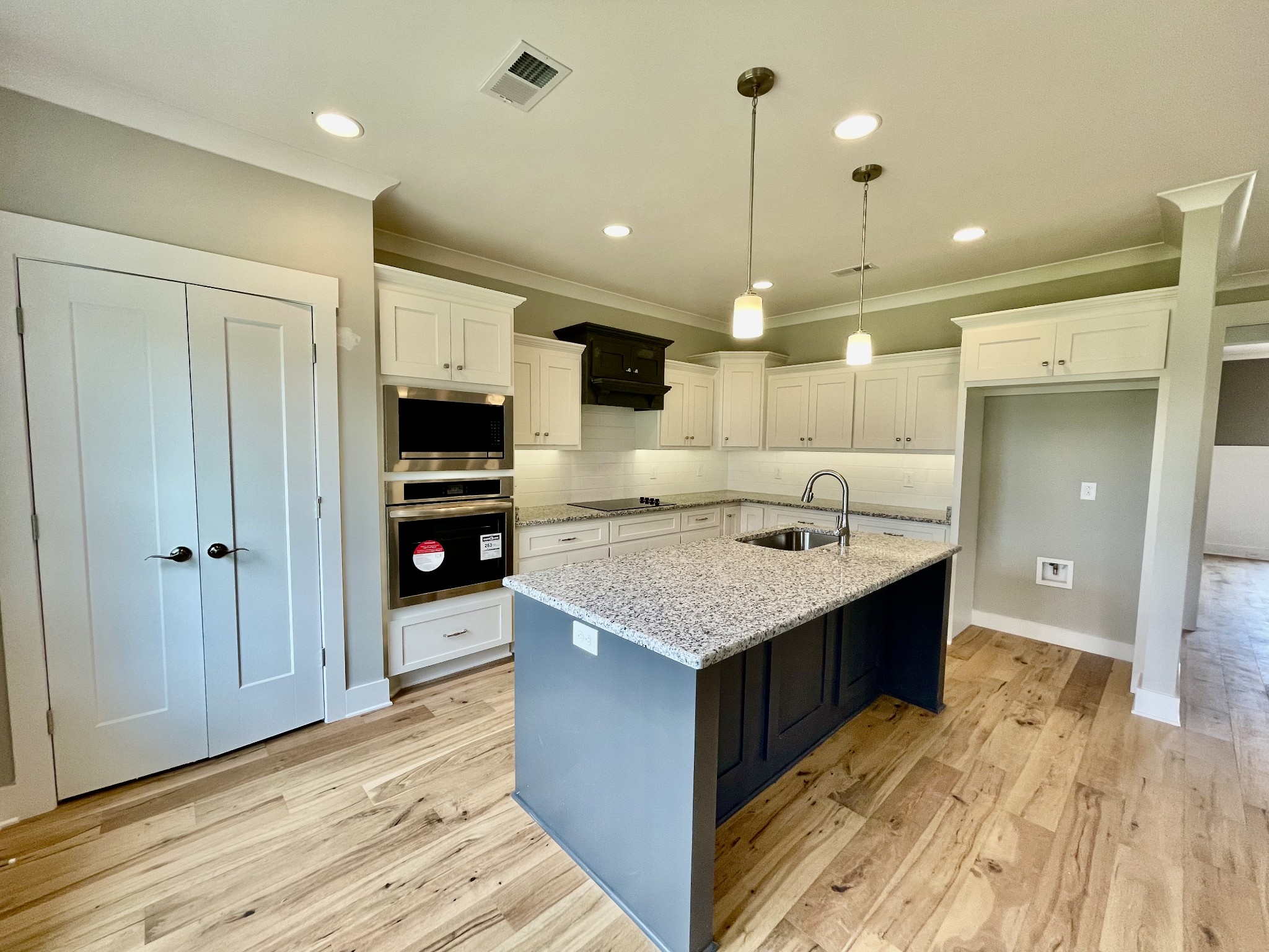 804 Becham Kenneth Circle Smyrna, TN 37167 - Photo 7 of 25 a kitchen with kitchen island a sink stainless steel appliances and cabinets