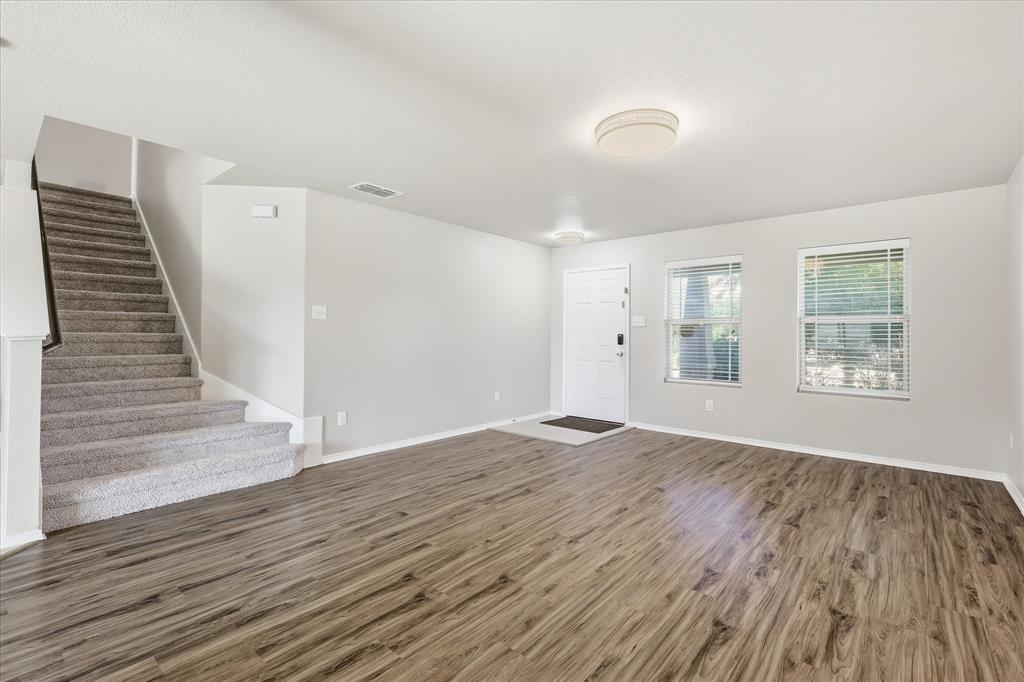 7708 Boat Wind Road Fort Worth, TX 76179 - Photo 4 of 23 Entrance area facing staircase