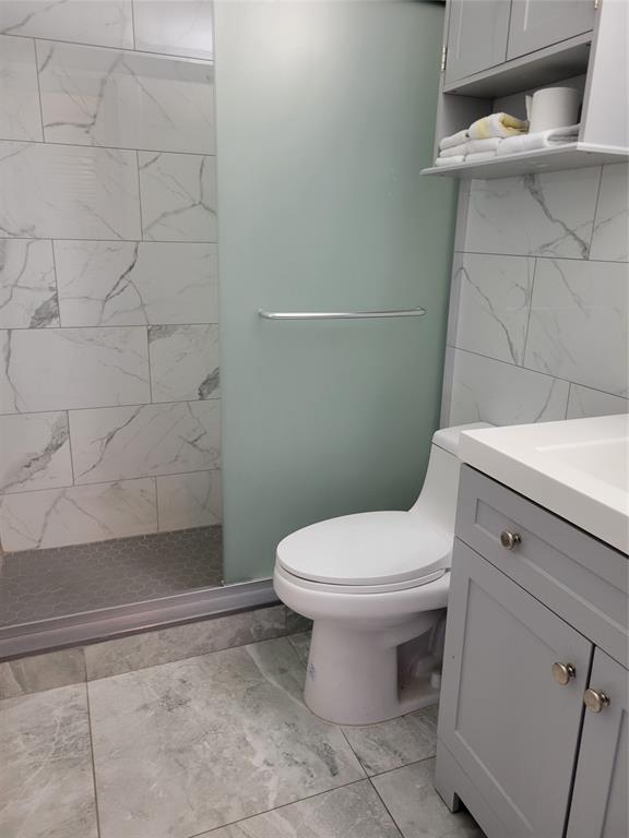 800 Southwest 11th Avenue, Unit 17 Hallandale Beach, FL 33009 - Photo 8 of 18 a bathroom with a toilet and a sink