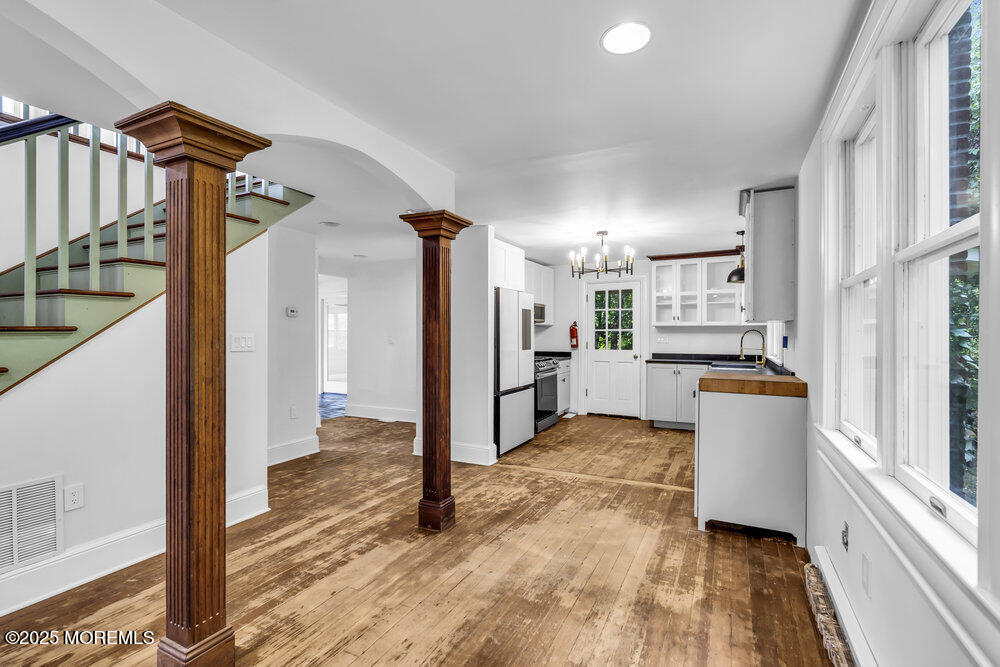 4 Oneida Avenue Atlantic Highlands, NJ 07716 - Photo 10 of 80 a view of a kitchen with furniture and a refrigerator