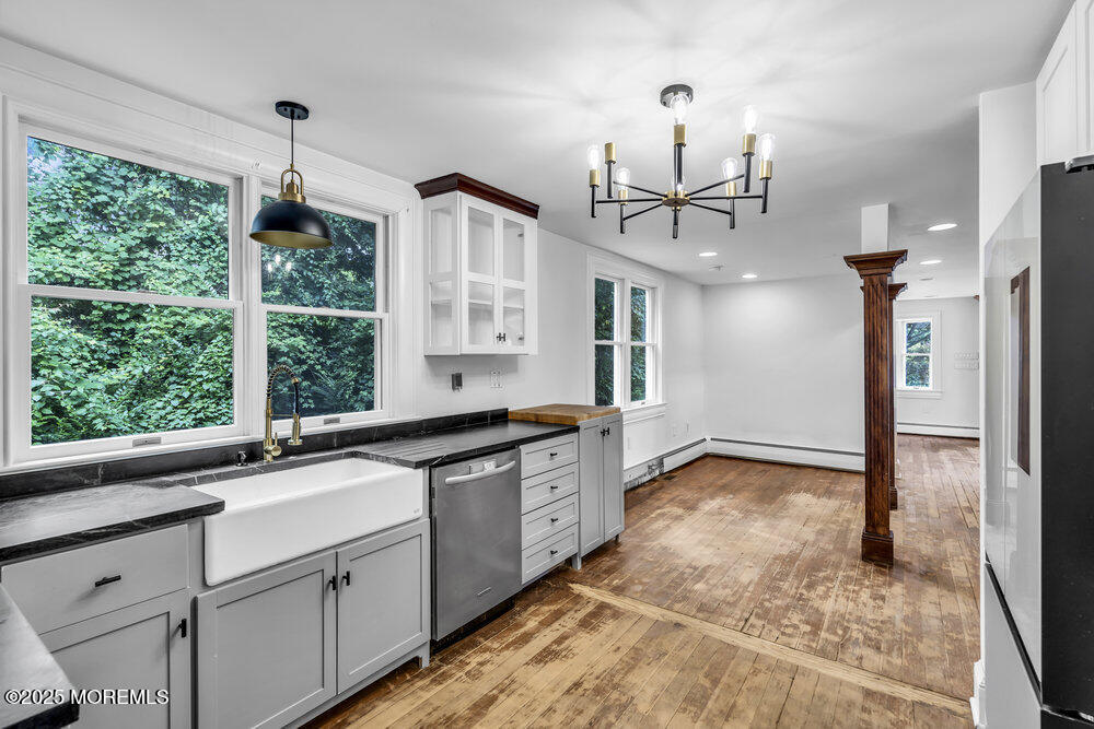 4 Oneida Avenue Atlantic Highlands, NJ 07716 - Photo 18 of 80 a very nice looking kitchen with a large window cabinets and chandelier