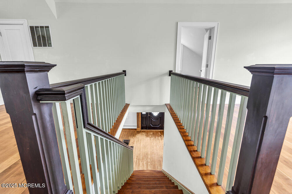 4 Oneida Avenue Atlantic Highlands, NJ 07716 - Photo 35 of 80 a view of a balcony with wooden floor and stairs